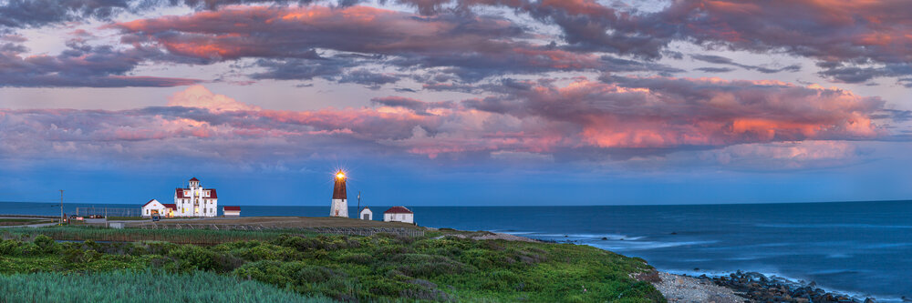 The Point Judith Rhode Island lighthouse at dusk. We offer many jobs and careers in the fishing industry in southern Rhode Island.